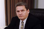 Mr. Ye.V. Lapin, Chairman of the Board